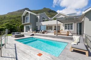 an image of a house with a swimming pool at Cape Beach Villa in Noordhoek