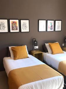 Postel nebo postele na pokoji v ubytování Apartamentos Élite - Art Collection - Pablo
