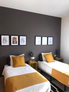 Postel nebo postele na pokoji v ubytování Apartamentos Élite - Art Collection - Pablo