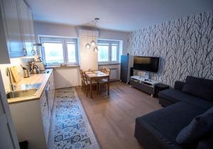 Kuchyňa alebo kuchynka v ubytovaní Apartament KRIS 412