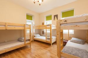 Postel nebo postele na pokoji v ubytování Nomado Hostel