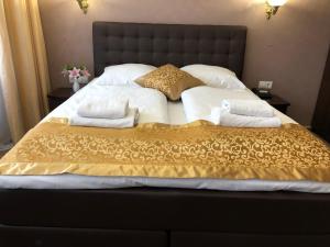 Postel nebo postele na pokoji v ubytování Atlas Berlin Hotel