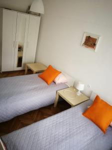 Posteľ alebo postele v izbe v ubytovaní Center Warsaw - Apartament Jana Pawła