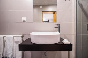Ванная комната в Buganvilias Do Meco Guest house
