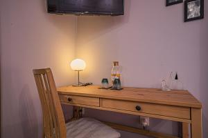 Телевизор и/или развлекательный центр в Buganvilias Do Meco Guest house