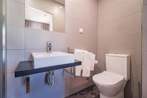 Ванная комната в Buganvilias Do Meco Guest house