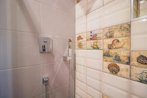 Ванная комната в Buganvilias Do Meco Guest house