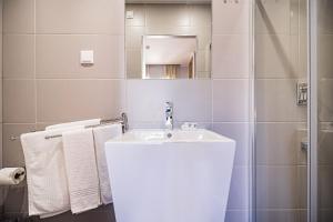 Ванная комната в Buganvilias Do Meco Guest house