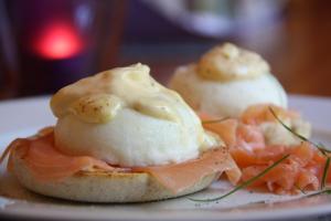 a plate of food with an egg on a sandwich at Ellen House Bed and Breakfast in Matlock