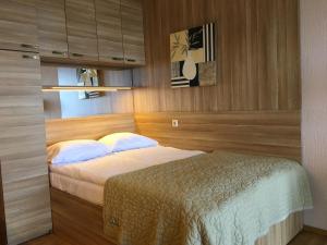 Tempat tidur dalam kamar di Curonian Coast studio