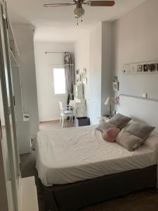 Ένα ή περισσότερα κρεβάτια σε δωμάτιο στο Apartamento primera línea de playa