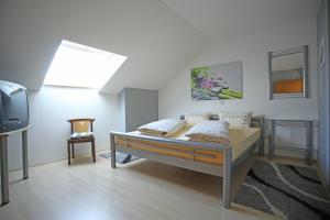 Katil atau katil-katil dalam bilik di Ferienwohnung Ramstein