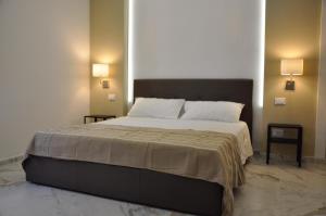 A bed or beds in a room at Beach apartments Isola d'Elba