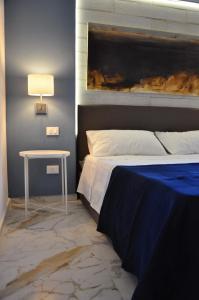 A bed or beds in a room at Beach apartments Isola d'Elba