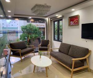 TV a/nebo společenská místnost v ubytování HODI Hotel