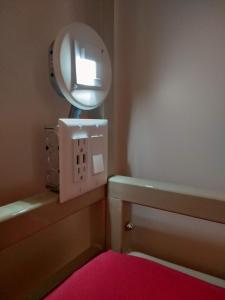 Cama ou camas em um quarto em Alt Hostel
