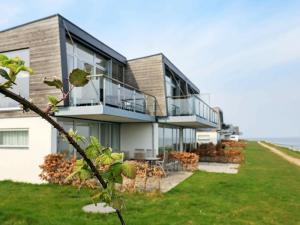 a house with a view of the ocean at 5 person holiday home in Stege in Stege