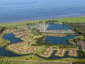 an aerial view of a marina with a lot of boats at 6 person holiday home in Otterndorf in Otterndorf