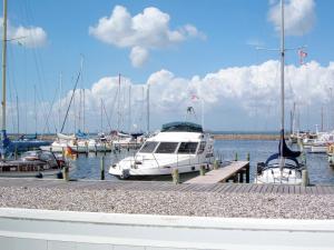 um grupo de barcos ancorados numa marina em 4 person holiday home in Nibe em Nibe