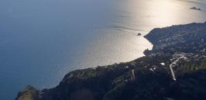 an aerial view of a mountain next to the ocean at Agriturismo Mare e Monti in Agerola