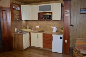 A kitchen or kitchenette at Drevený raj