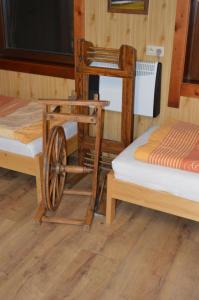 A bed or beds in a room at Drevený raj
