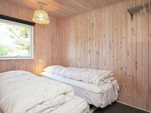 Postel nebo postele na pokoji v ubytování 7 person holiday home in Struer-By Traum