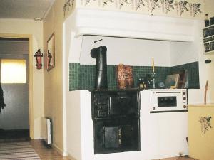 Kuchyň nebo kuchyňský kout v ubytování 6 person holiday home in RYSSBY