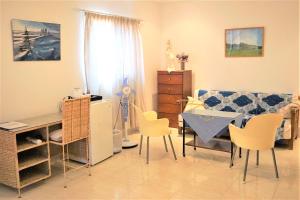 Posezení v ubytování B & B Villa Calliandra