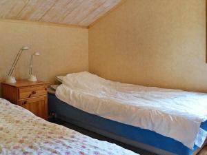 Postel nebo postele na pokoji v ubytování Four-Bedroom Holiday home in S-Uddvalla