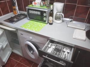 Kuchyň nebo kuchyňský kout v ubytování Calea Victoriei Residence