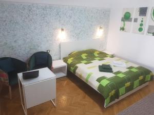 Postel nebo postele na pokoji v ubytování Calea Victoriei Residence