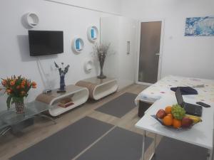 TV a/nebo společenská místnost v ubytování Calea Victoriei Residence