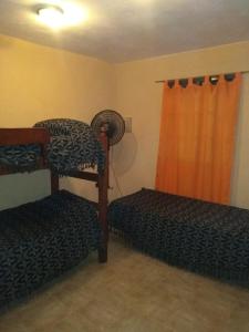 Postel nebo postele na pokoji v ubytování Complejo Norte + 16 fotografií