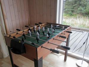 a large foosball table with at 10 person holiday home in Harbo re in Harboør