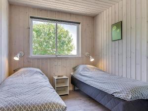 Postel nebo postele na pokoji v ubytování Luxury Retreat by Hvidbjerg Beach - By Traum Ferienwohnungen