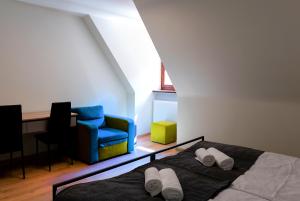 Łóżko lub łóżka w pokoju w obiekcie Hotel Spichlerz Pierwszy SPA & WELLNESS