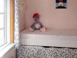 En eller flere senge i et værelse på Holiday home Vordingborg V