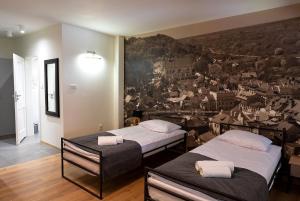 Posteľ alebo postele v izbe v ubytovaní Hotel Spichlerz Pierwszy SPA & WELLNESS
