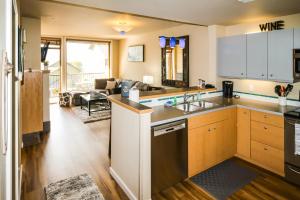 a kitchen with a sink and a counter top at Chelan Resort Suites 2 in Chelan