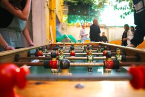 a group of lego men playing a game of pool at Lisbon Chillout Hostel in Lisbon