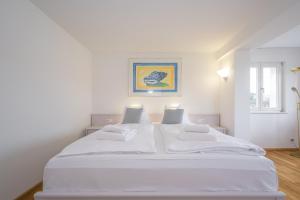 Ένα ή περισσότερα κρεβάτια σε δωμάτιο στο Pension Am Meer