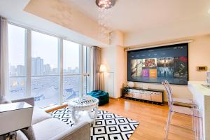 TV a/nebo společenská místnost v ubytování S6 Service Apartment（Chengdu Chunxi Road Taikoo Li Branch）