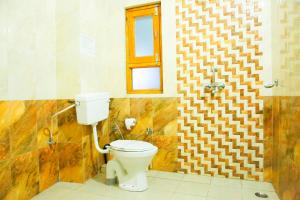 Φωτογραφία από το άλμπουμ του Hotel Avlokan - Near Kainchi Dham Mandir σε Bhowāli