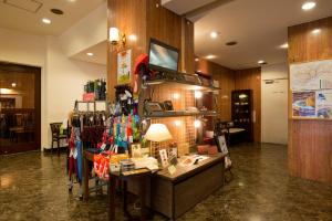 a store with a desk in a room at Kadoya Hotel in Tokyo