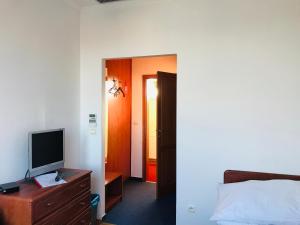 Postel nebo postele na pokoji v ubytování Hotel Nostalgia