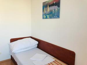 Postel nebo postele na pokoji v ubytování Hotel Nostalgia