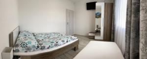 Posteľ alebo postele v izbe v ubytovaní Apartmán Pod Klinom