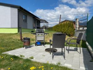 Vonkajšia záhrada v ubytovaní Apartmán Pod Klinom