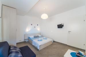Posteľ alebo postele v izbe v ubytovaní Apartments Keran